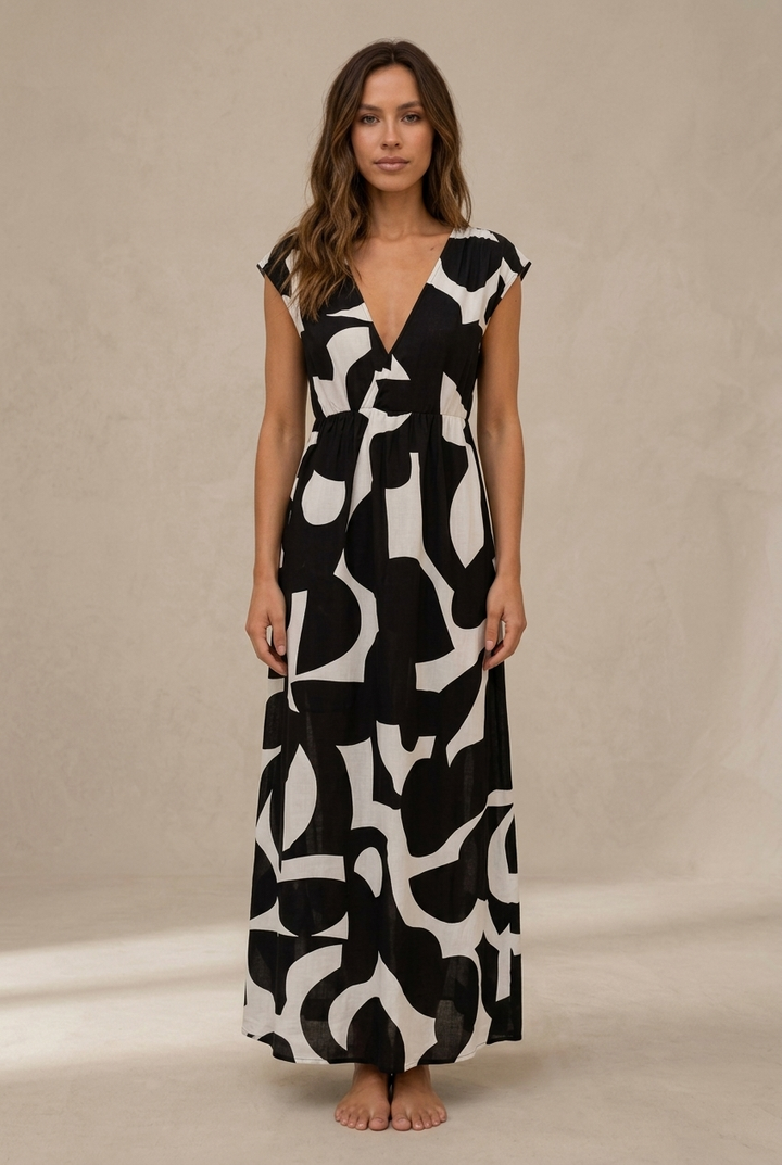 Camelia | Fluid midi dress with vibrant print